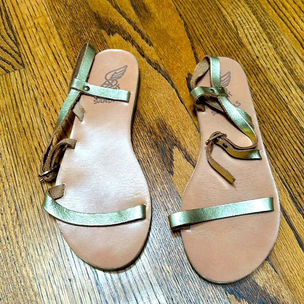 Ancient Greek light gold sandals.